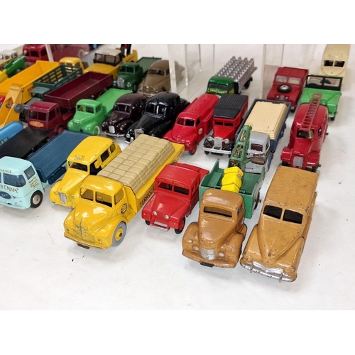 305 - Large group of vintage play worn die cast vehicles to include many examples by Dinky and Corgi (50).