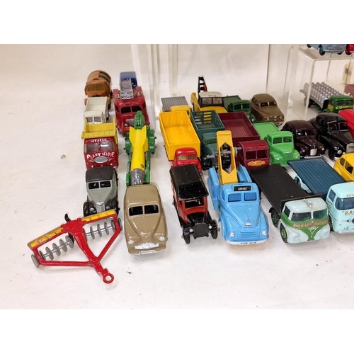 305 - Large group of vintage play worn die cast vehicles to include many examples by Dinky and Corgi (50).