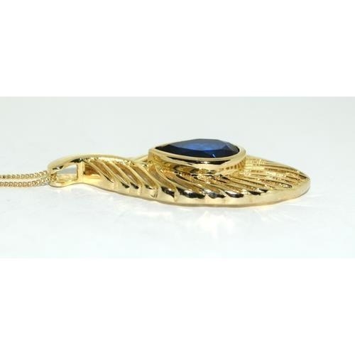 180 - Synthetic sapphire 14ct gold on 925 silver Peacock feather pendant