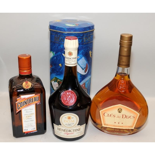 65 - 3 bottles alcohol to include Cointreau. Ref:W