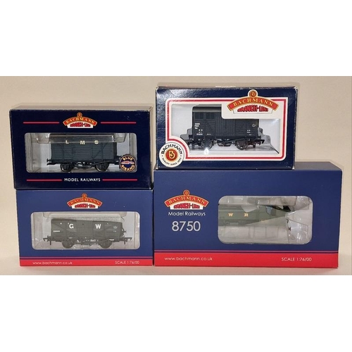 49 - Bachmann OO Gauge 32-208 Class 8750 locomotive together with a group of wagons. All in unused condit... 