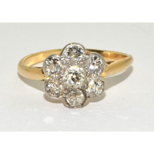 200 - Diamond 18ct gold (tested) daisy ring in box Size M