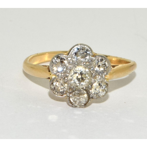 200 - Diamond 18ct gold (tested) daisy ring in box Size M