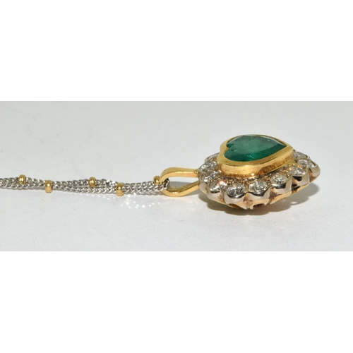 206 - Emerald heart shape with diamonds set in 18ct gold with 18ct gold two tone chain