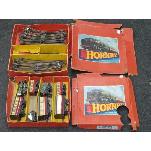 65 - Hornby vintage clockwork passenger train set No. 21 in play worn condition split amongst two boxes. ... 