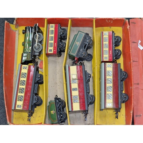 65 - Hornby vintage clockwork passenger train set No. 21 in play worn condition split amongst two boxes. ... 