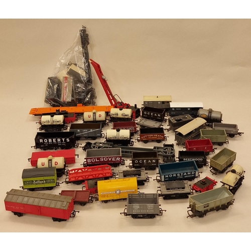 101 - Large collection of unboxed OO Gauge wagons and rolling stock.