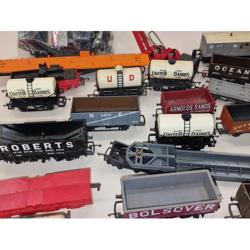 101 - Large collection of unboxed OO Gauge wagons and rolling stock.