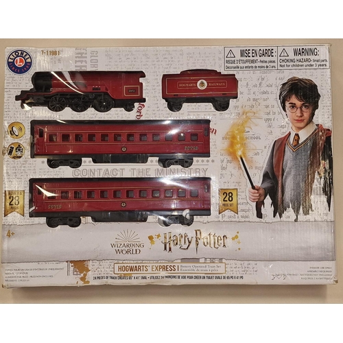 107 - Lionel Wizarding World of Harry Potter Hogwarts Railways boxed train set appears complete.