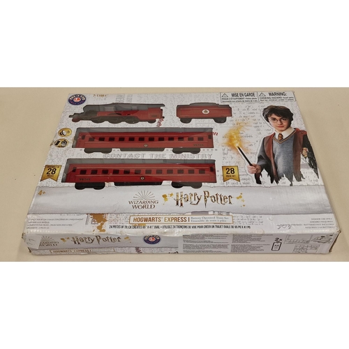 107 - Lionel Wizarding World of Harry Potter Hogwarts Railways boxed train set appears complete.