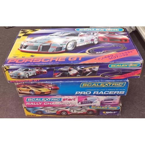 219 - Quantity of Scalextric track and controllers to include cars