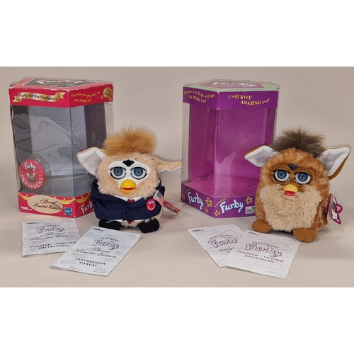 225 - Two boxed vintage Furby's both with boxes and instructions to include Limited Edition President Furb... 