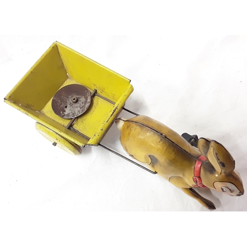 477 - Dog Chase (Japan) tinplate wind up toy in box together with British made tinplate Rabbit pulling a c... 