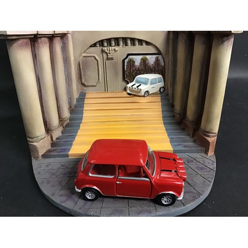 406 - Corgi  The Italian Job Diorama with red mini CC82217 plus Red Boxed mini CC82215. Supplied here in o... 