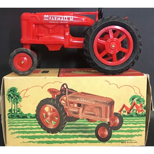 229 - Plastic model Toy Farmall Diesel Tractor complete with original box.