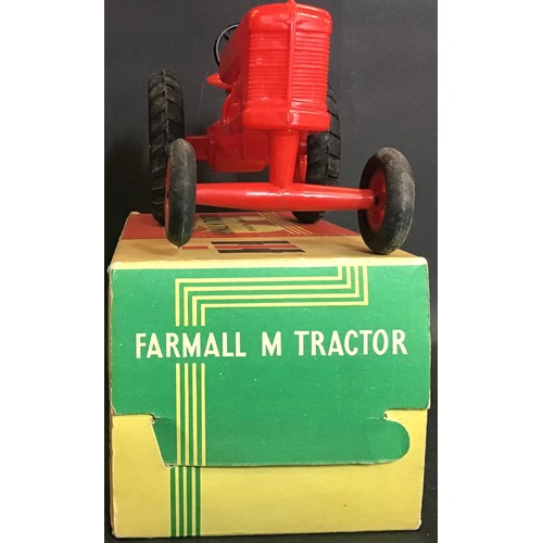 229 - Plastic model Toy Farmall Diesel Tractor complete with original box.