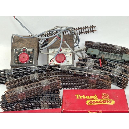 178 - Collection of vintage Tri-ang OO gauge track, boxed and unboxed c/w 2 x controllers