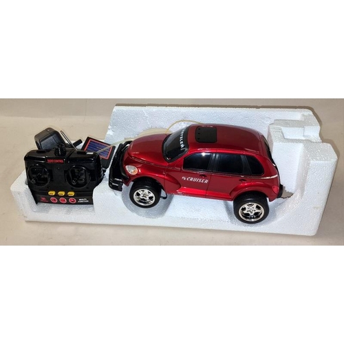 239 - New Bright Chrysler PT Cruiser boxed radio controlled vehicle.