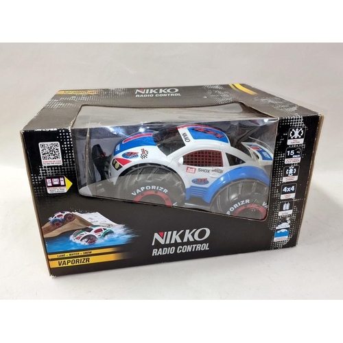 241 - Nikko radio control vaporizr boxed car together with a boxed Extreme Machines SRT Viper car (2).