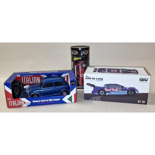 243 - Collection of boxed radio controlled vehicles to include The Italian Job Mini Cooper (3).