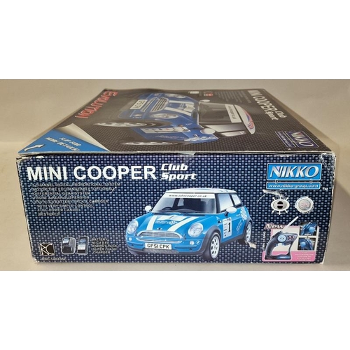 245 - Nikko Mini Cooper Sport Evolution boxed radio controlled car.