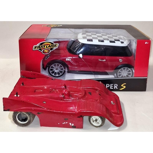 251 - Fast Lane boxed radio controlled Mini Cooper S car together with a vintage unboxed radio controlled ... 