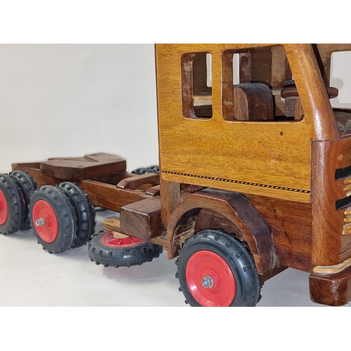 255 - Hand built wooden vintage toy model of a pick up truck 40cm tall.