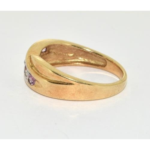 356 - 9ct gold ladies diamond and Pink Tourmaline cross over ring size M