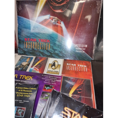 256 - Star Trek collection of collectable phone cards. Loose and in sets. Majority still sealed/unopened.