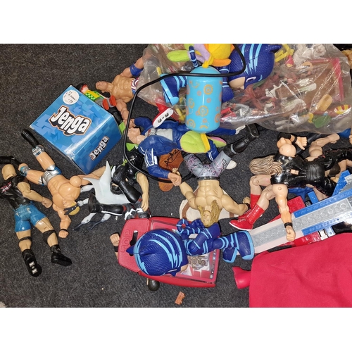 259 - Large collection of various action figures to include Toy Story and WWE Wrestlers.