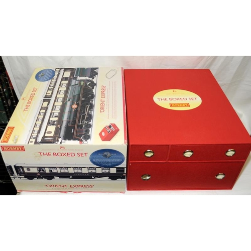 142 - Hornby 00 gauge 'Orient Express' The boxed set ref:R1038. Outer box opened but contents appear compl... 