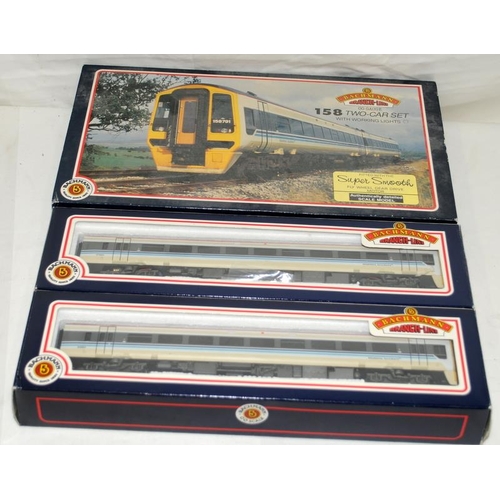 164 - Bachmann 00 gauge 158 Two Car set with working lights ref:30-500A. Box has storage wear and damage t... 