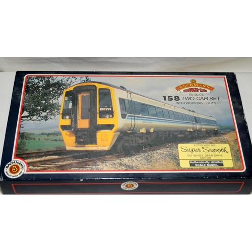 164 - Bachmann 00 gauge 158 Two Car set with working lights ref:30-500A. Box has storage wear and damage t... 