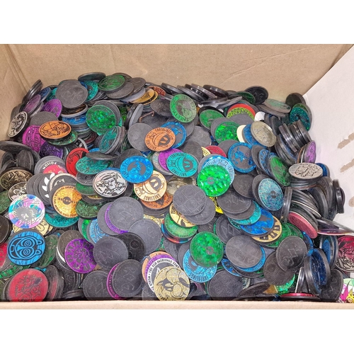 268 - Large box containing a collection of unsorted pogs. Huge assortment to look through!