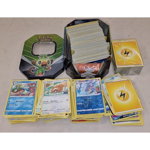 271 - Large collection of unsorted Pokemon trading cards to include a sealed pack. Good lot to sort throug... 