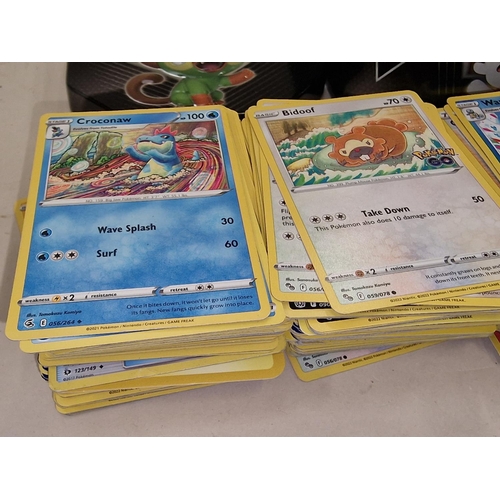 271 - Large collection of unsorted Pokemon trading cards to include a sealed pack. Good lot to sort throug... 