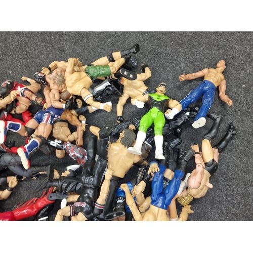 273 - Collection of plastic wrestling action figures.