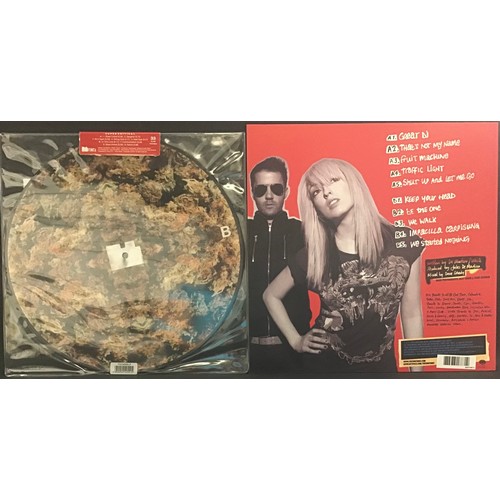 349 - 2 ALBUMS BY THE TING TINGS. First we have a picture disc ‘Super Critical’ which is a limited edition... 