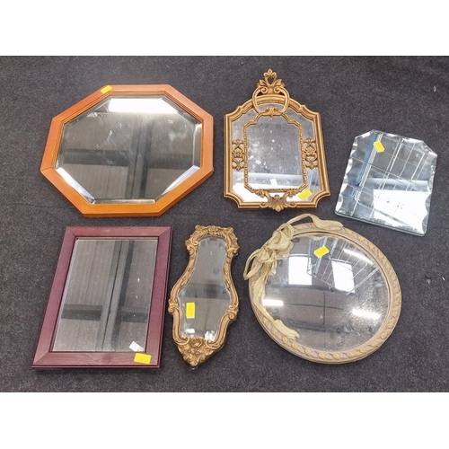 576 - A collection of wall mirrors to include gilded and a concave example (6).