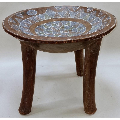 580 - Wooden tribal design side table with internal decoration 37cm tall.