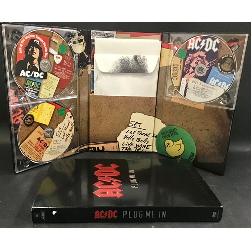 475 - AC/DC ‘PLUG ME IN 3 DVD BOXED SET. Collectors Edition, with extras Poster, Tickets Etc. Found here i... 