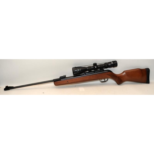 125 - Gamo Magnum 3000 .22 break barrel air rifle with fitted Nikko Stirling Mountmaster scope.  Comes in ... 