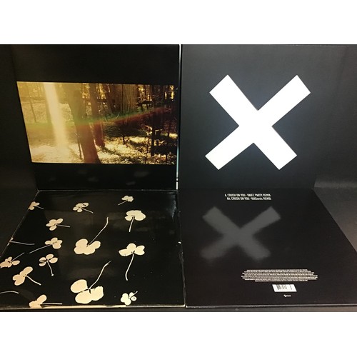 353 - SELECTION OF 4 VINYL LP AND 12” RECORDS. Here we have the following - The XX (new vinyl with poster)... 