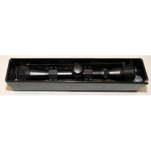 132 - 4 x 32 rifle scope, appears unused.