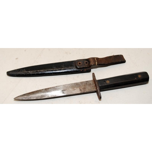 139 - Solingen fighting knife/dagger with metal scabbard. Indistinct marks to blade, possibly WW2 German i... 