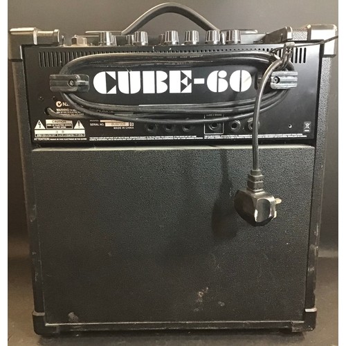 461 - ROLAND CUBE -60 GUITAR AMPLIFIER. Neat compact amp which powers on fine when plugged in.