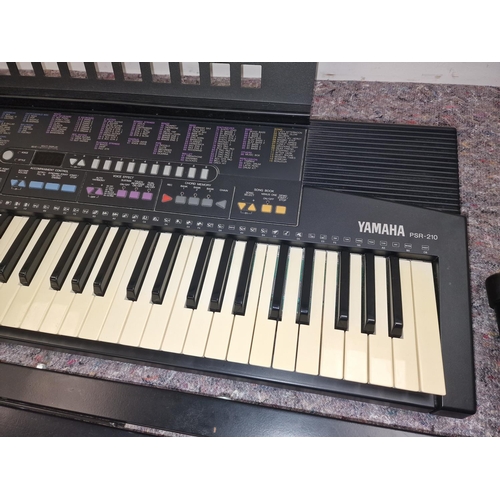 376 - Yamaha PSR-210 electric keyboard on stand with cables