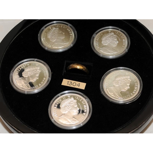 110 - Set of 5 Lord of the rings 1oz silver crowns in a numbered presentation case c/w a silver gilt ring