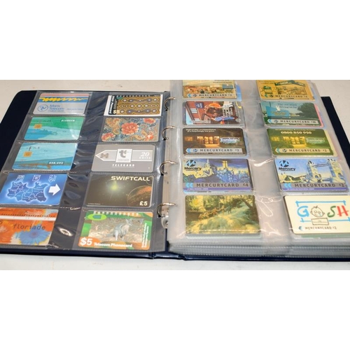 177 - Very large collection of phone cards contained within 2 albums. 100's of cards well worth a sort thr... 