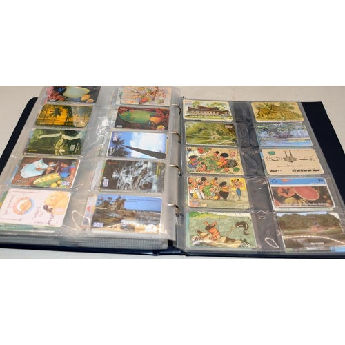 177 - Very large collection of phone cards contained within 2 albums. 100's of cards well worth a sort thr... 